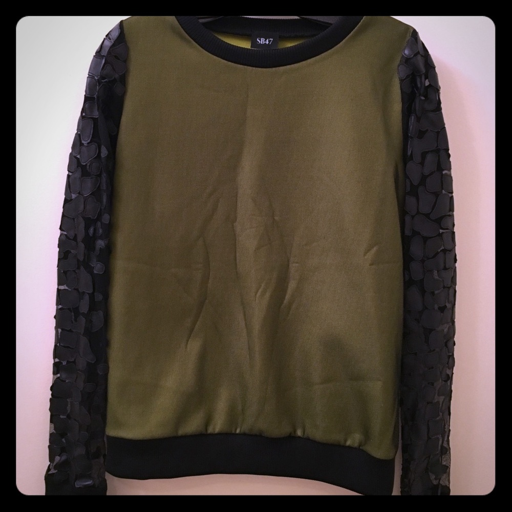 SB 47 brand new sweater that is sample size